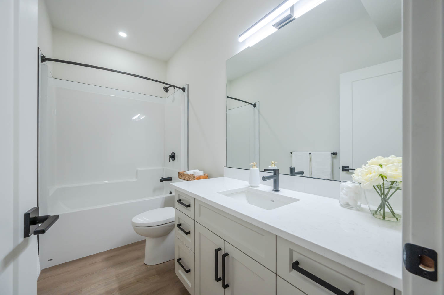 Bathroom interior with sink, toilet, and bathtub