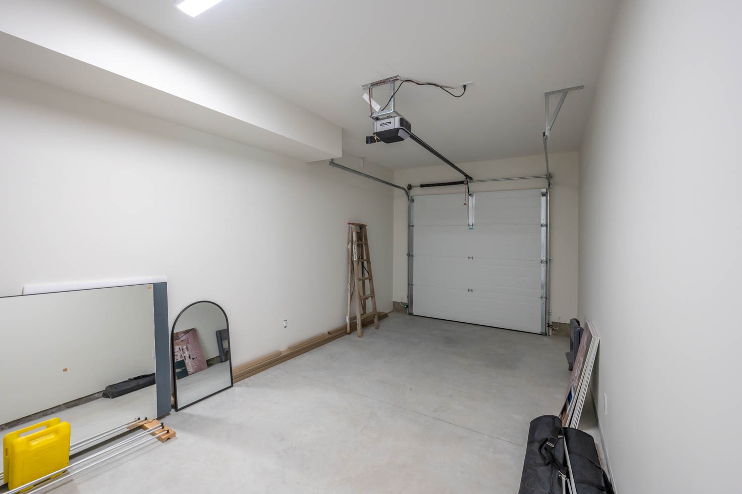 Garage interior with mirror and ladder