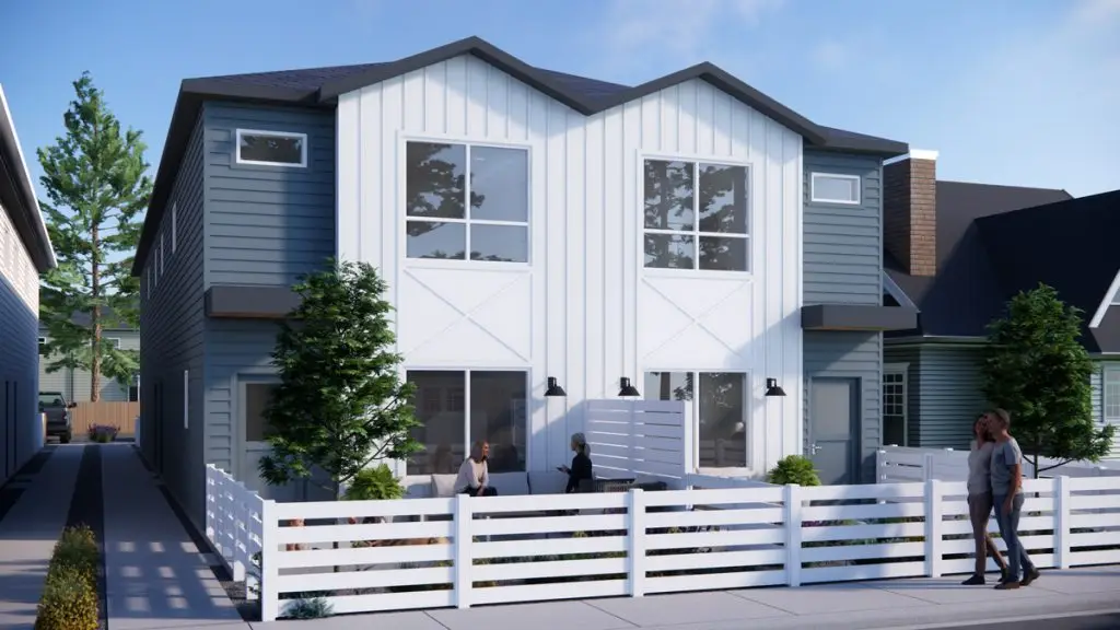 Modern semi-detached house with two stories, white and gray exterior, and a fenced front yard.
